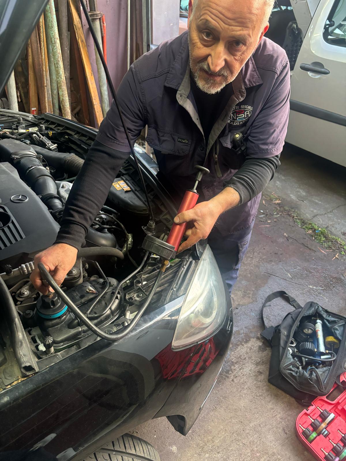 Arthur Tarakjian of North Shore Radiators working on Mercedes Benz AMG radiator