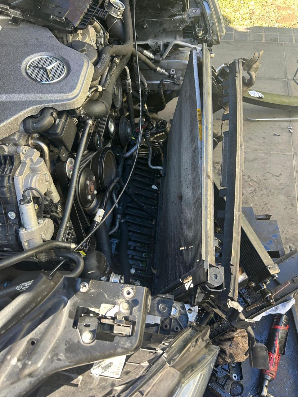 Arthur Tarakjian of North Shore Radiators before replacing a Mercedes Benz AMG radiator